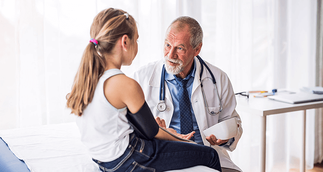 doctor-img-mobile doctor treating a kid