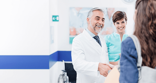 hand-sheak-mobile doctor doing a handshake